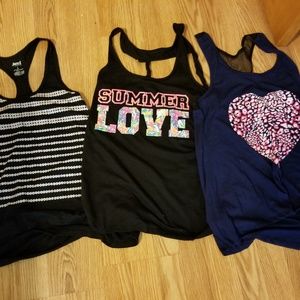 **Gently Used Bundle***  three workout tank tops